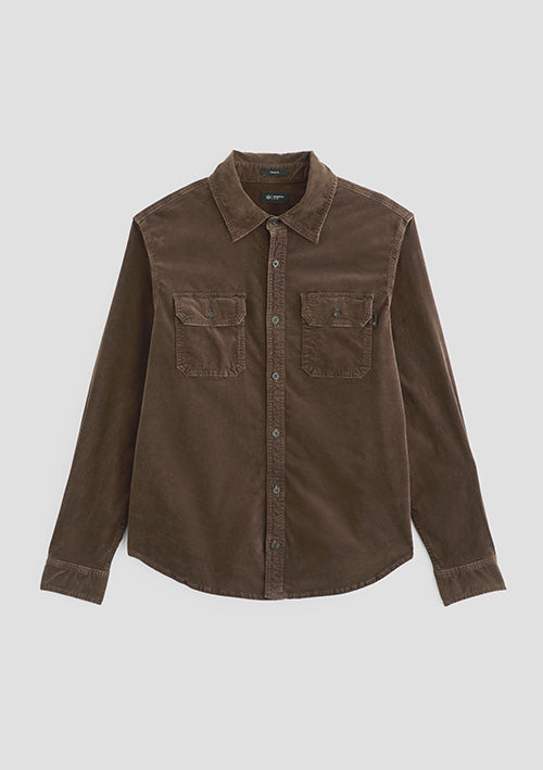 A dark brown corduroy button-down shirt with two chest flap pockets, displayed flat against a light gray background.