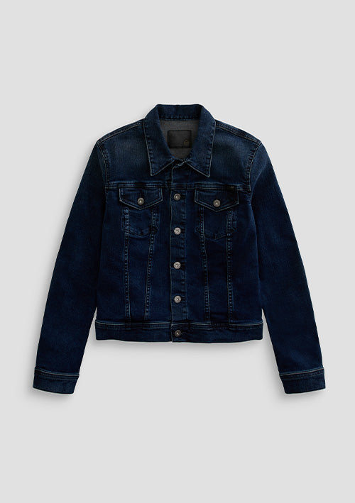 A dark blue denim trucker jacket with button closures and flap chest pockets, displayed flat against a light gray background.