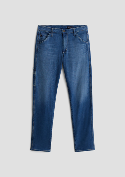 A pair of medium wash blue denim jeans with a subtle vertical fading effect, shown flat against a light gray background.