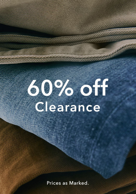 A promotional sale graphic showing folded fabric clothing in muted blue, brown, and taupe tones with large white text reading '60% off Clearance' and smaller text 'Prices as Marked.'.