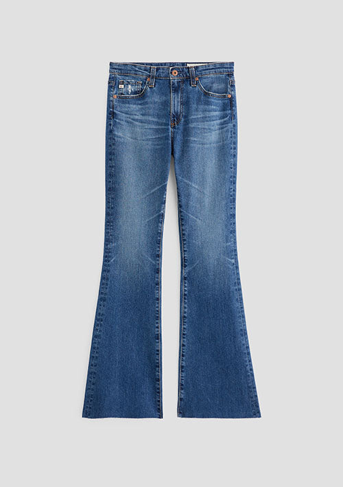 Medium wash blue denim flare jeans with whiskering and fading on the thighs, shown flat against a light gray background.