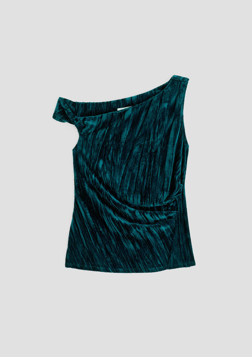 A dark teal green velvet top with an asymmetrical draped neckline and one rolled shoulder detail, shown flat on a light gray background.